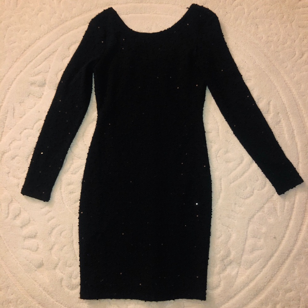 Form fitting Jennifer Lopez LBD